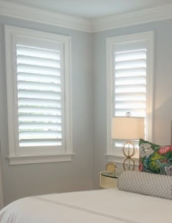 White plantation shutters with hidden tilt rods in Tampa